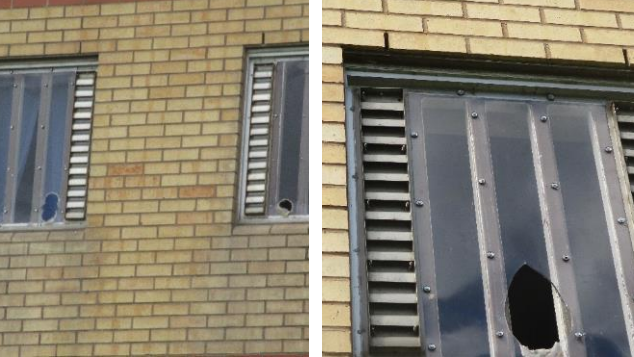 Two shots of windows at HMP Garth. It shows a brick wall, with windows that have metal bars and Perspex screwed over the opening. There are holes burned in the Perspex of all three windows in the image.