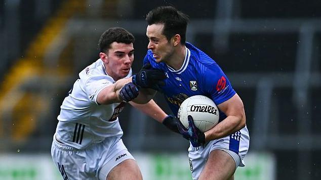 Cavan's Gerard Smith is challenged by Eoin Lawlor
