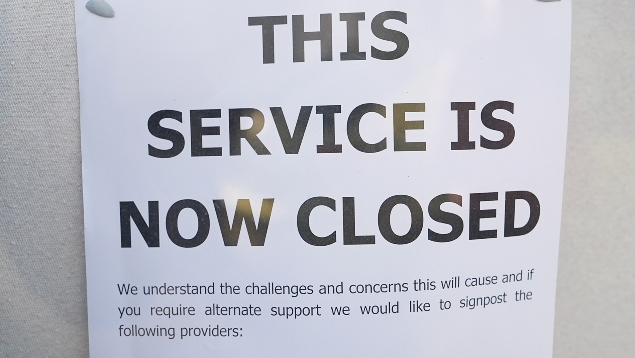 The image shows a sign which reads 'service now closed'. Some smaller text underneath states ' we understand the challenges and concerns this will cause and if you require alternate support we would like to signpost the following providers' but the picture stops there so you cannot see the list