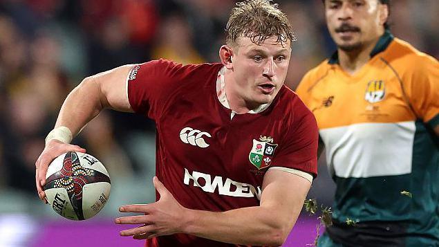 Jac Morgan carrying the ball for Lions
