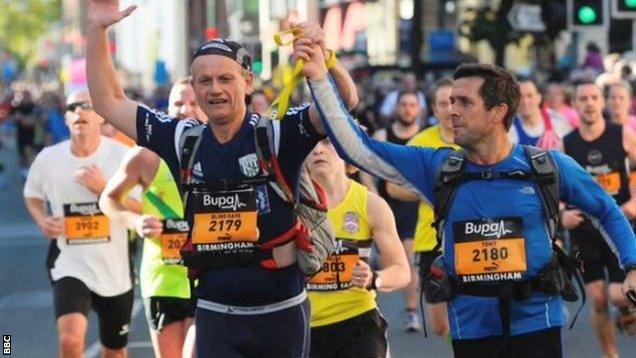 'Blind Dave' celebrates running a marathon