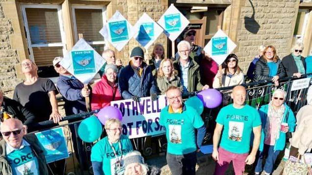 Protesters outside Rothwell's old civic building in October 2023