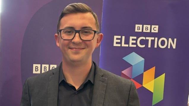 Connor Naismith in front of a BBC Election 24 banner