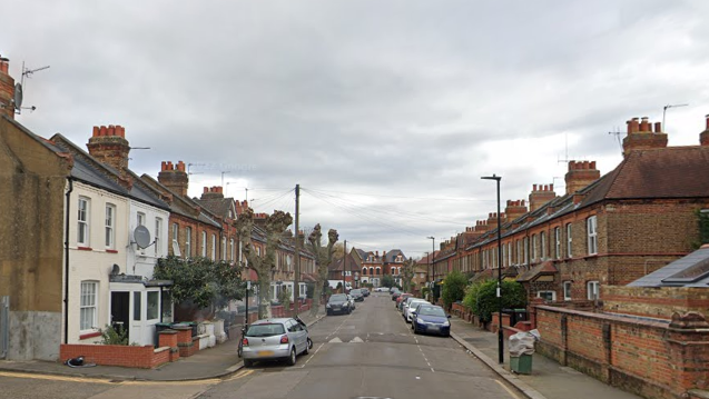 A street of two-storey terraced houses in north London 