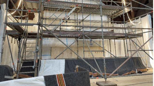 Metal scaffolding securing the interior parts of the church
