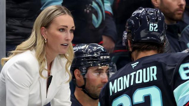 Jessica Campbell passes on instructions during the NHL game between the Seattle Kraken and the St Louis Blues