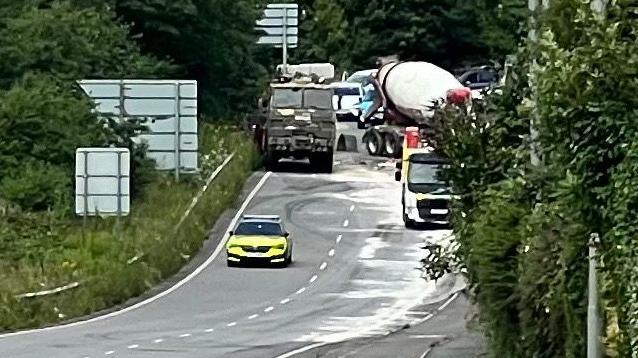 Picture of emergency services and lorry at A38 Forder Valley Interchange