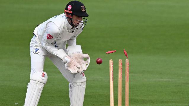 John Simpson keeping wicket for Sussex.