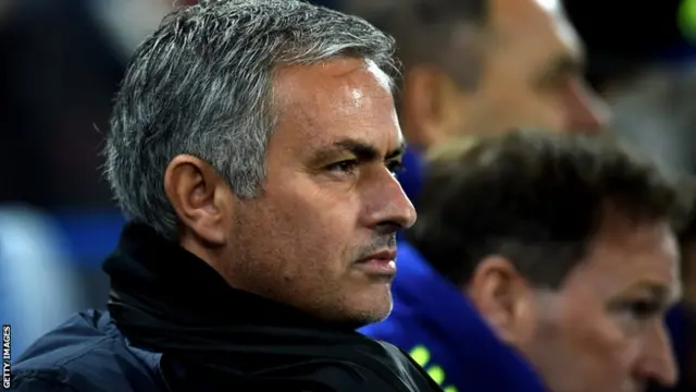 Jose Mourninho looks on