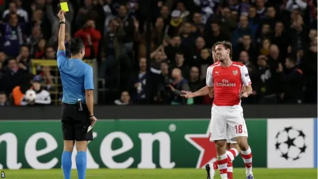 Nacho Monreal is given a yellow card