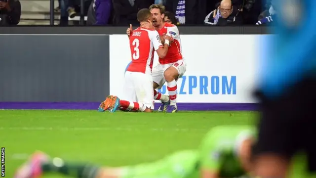 Kieran Gibbs celebrates