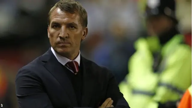 Brendan Rodgers looks on