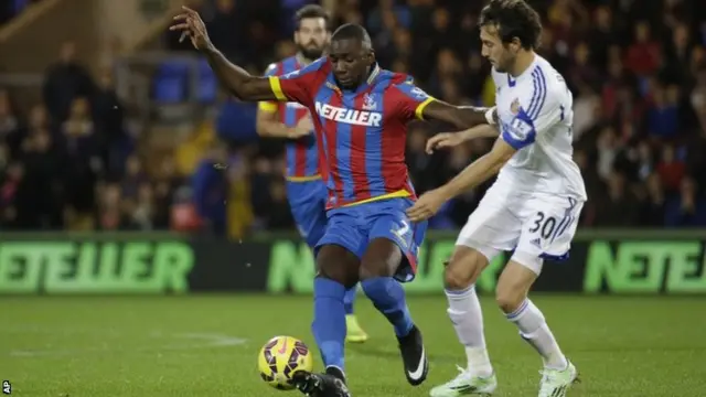 Yannick Bolasie competes for the ball with Sunderland's Will Buckley