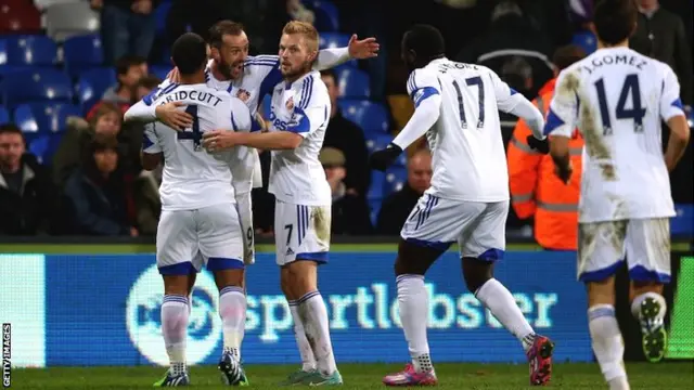 Steven Fletcher celebrates with teammates