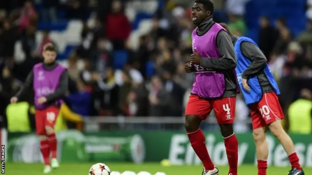 Kolo Toure warms up