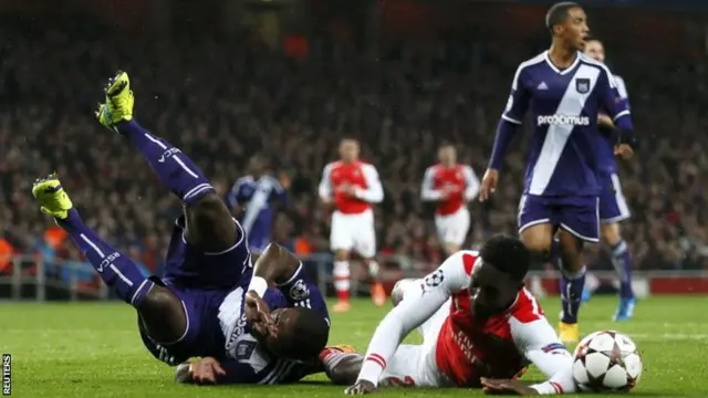 Danny Welbeck is fouled by Chancel Mbemba