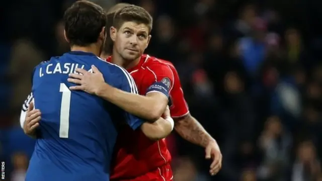Iker Casillas embraces Steven Gerrard at full-time