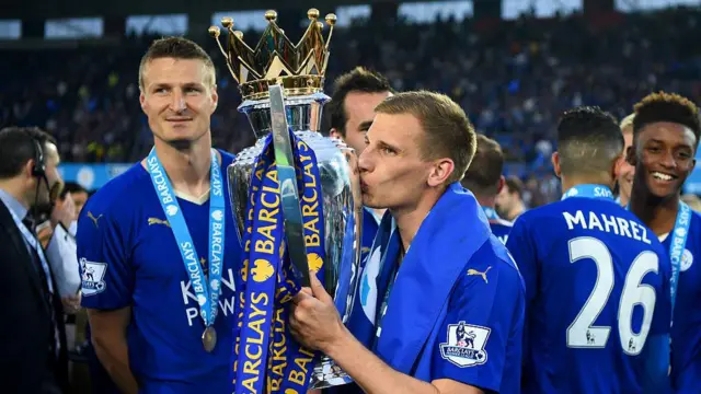 Marc Albrighton kissing the Premier League trophy