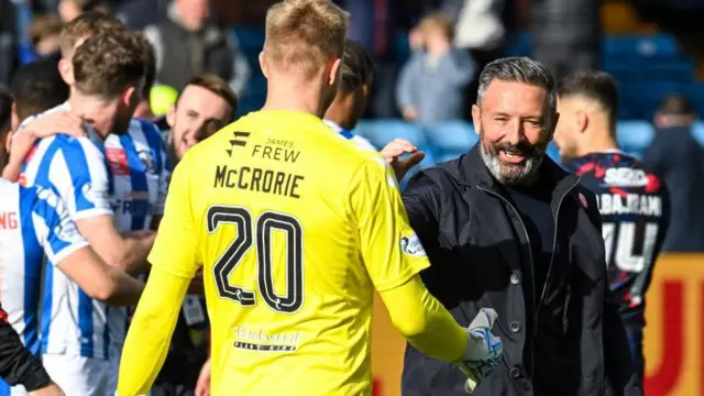 Kilmarnock manager Derek McInnes celebrates with his players 