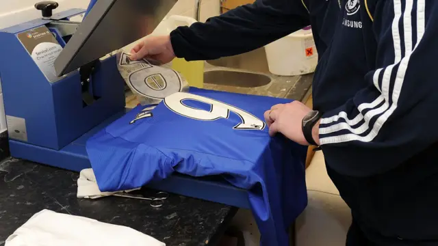 A Chelsea shirt gets printed with a number nine