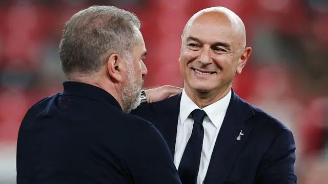 Daniel Levy embraces Ange Postecoglou after Europa League win