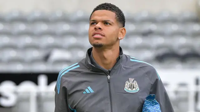 William Osula in a Newcastle tracksuit