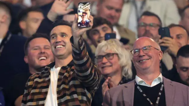 Rob McElhenney shows phone call with Ryan Reynolds to fans at the Birmingham City versus Wrexham fixtures