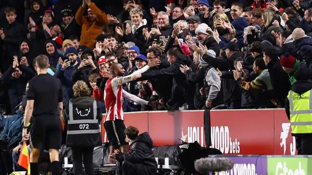 Igor Thiago celebrates with Brentford fans