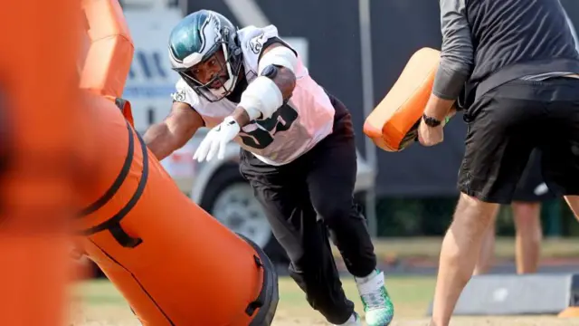 Brandon Graham makes a tackle during practice before Super Bowl 59