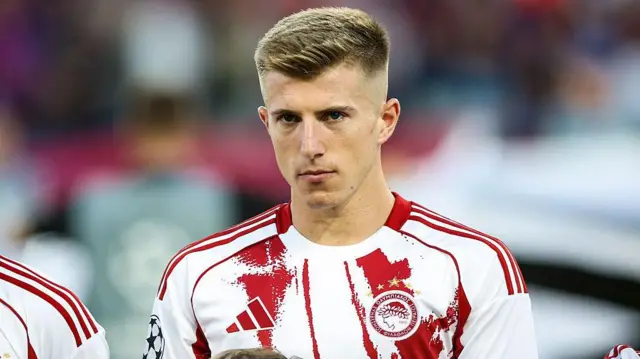 Costinha lining up for Olympiacos in the Champions League 