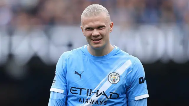 Manchester City striker Erling Haaland takes a deep breath
