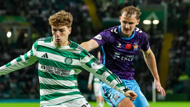 Celtic's Arne Engels and Kilmarnock's Zac Williams