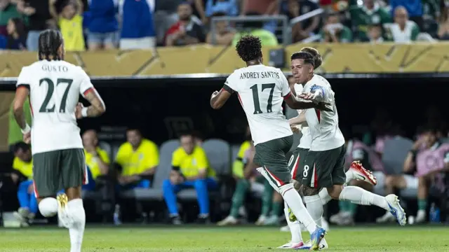 Enzo Fernandez celebrates with his Chelsea team-mates after a goal against Palmeiras