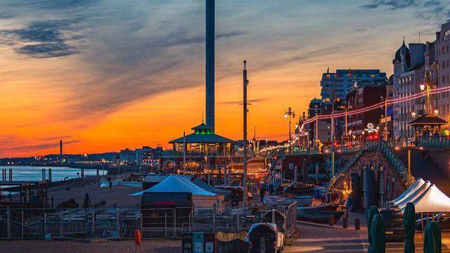 An orange and blue sky over brighton.