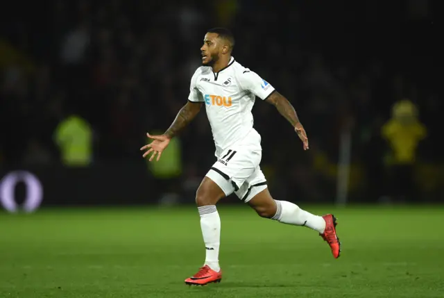 Luciano Narsingh, arms outstretched, celebrates scoring for Swansea at Watford