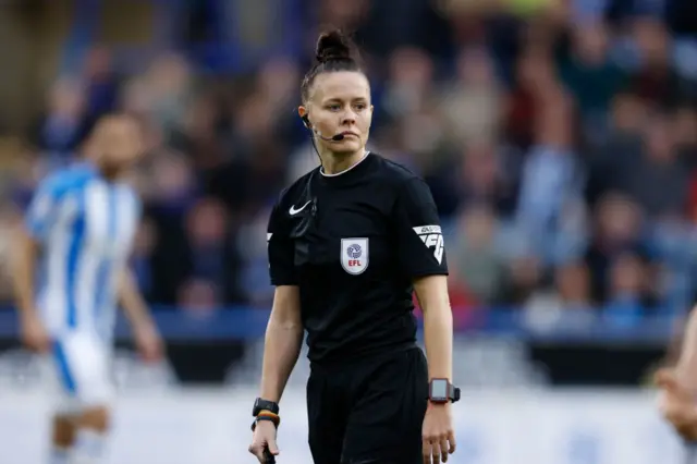 Rebecca Welch refereeing