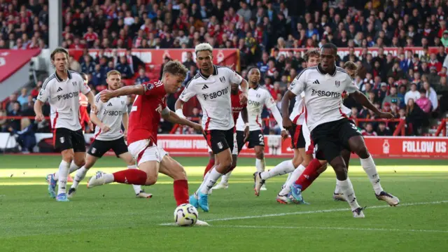 Nottingham Forest's Ryan Yates see's his shot blocked during the Premier League match between Nottingham Forest FC and Fulham FC at City Ground