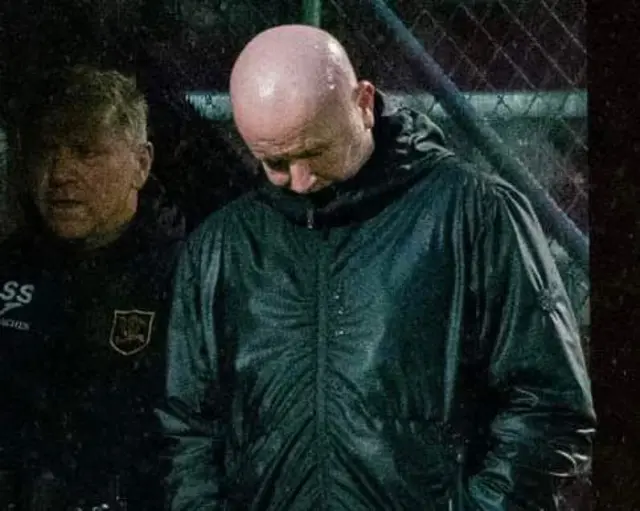 David Martindale with his head down as he watches on at Fir Park.