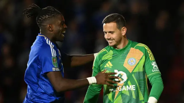 Caleb Okoli of Leicester City celebrates with teammate Danny Ward after winning the penalty shoot out of the Carabao Cup Third Round match between Walsall and Leicester City at Poundland Bescot Stadium