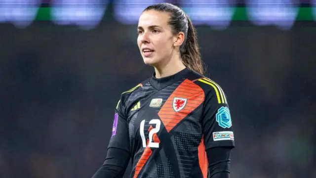 Olivia Clark playing for Wales