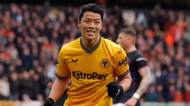 Hwang Hee-chan celebrates scoring against Luton