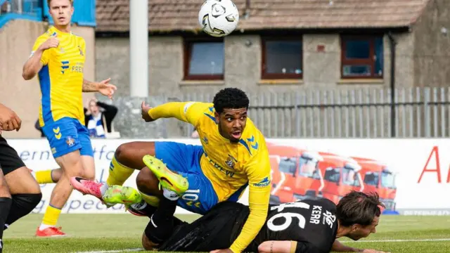 Kilmarnock's Tyreece John-Jules and Peterhead's Joshua Kerr