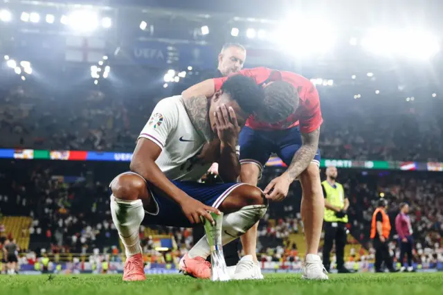 Ollie Watkins celebrates with England players