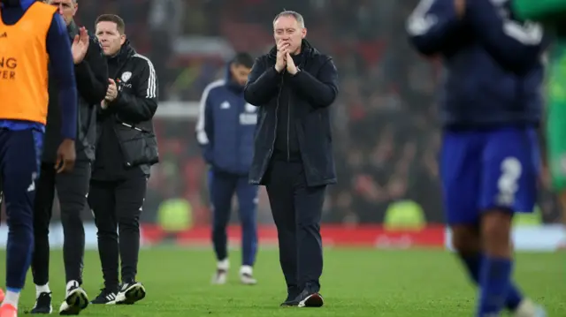 Steve Cooper applauds supporters after a Leicester City defeat