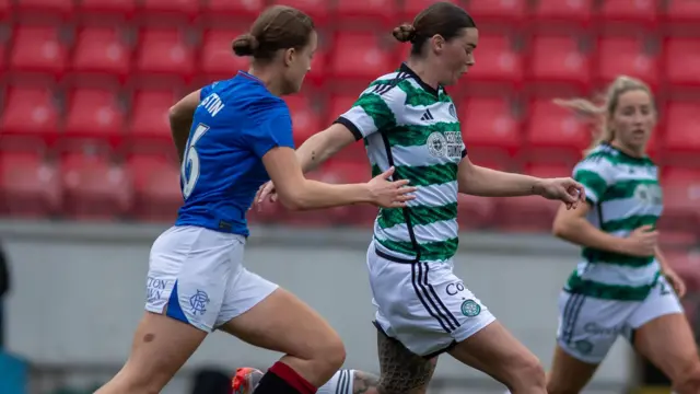 Natasha Flint and Eilidh Austin battle for the ball