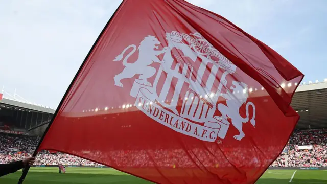 A Sunderland flag being waved