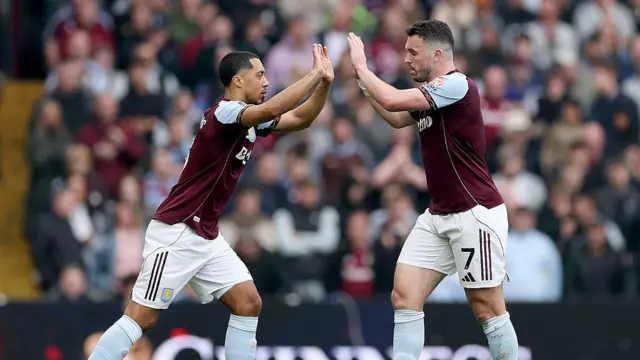 Youri Tielemans comes on as a substitute for team-mate John McGinn