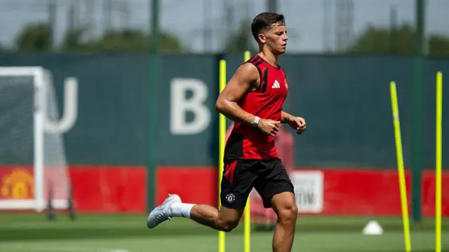 Shea Lacey of Manchester United in action during a pre-season training session at Carrington