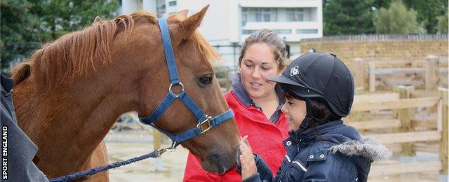 child and horse