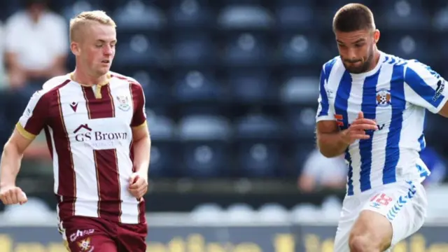 St Johnstone's Cameron MacPherson and Kilmarnock's Innes Cameron